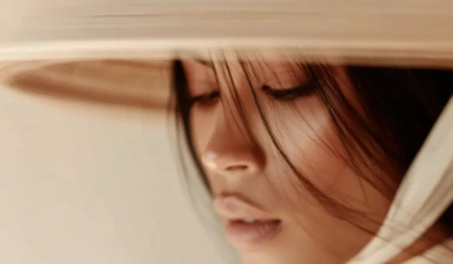 CoBa's Daughter - Vietnamese woman with wearing the Nón Lá (conical hat) in a peaceful, serene atmosphere.