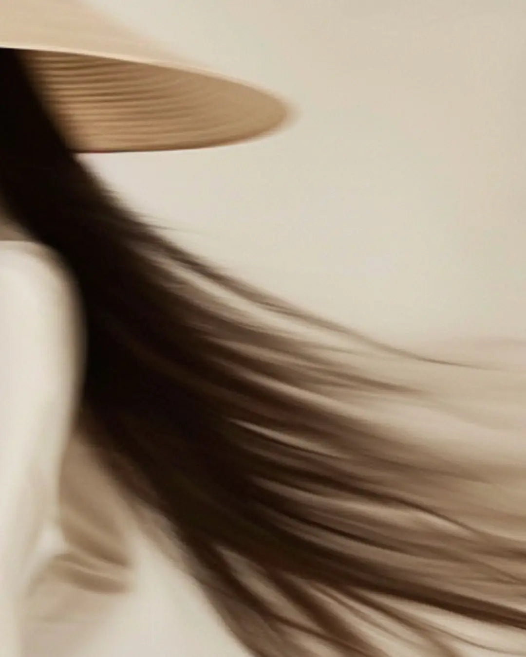 CoBa's Daughter figure wearing the Nón Lá (Vietnamese conical hat), walking confidently with hair flying with the wind