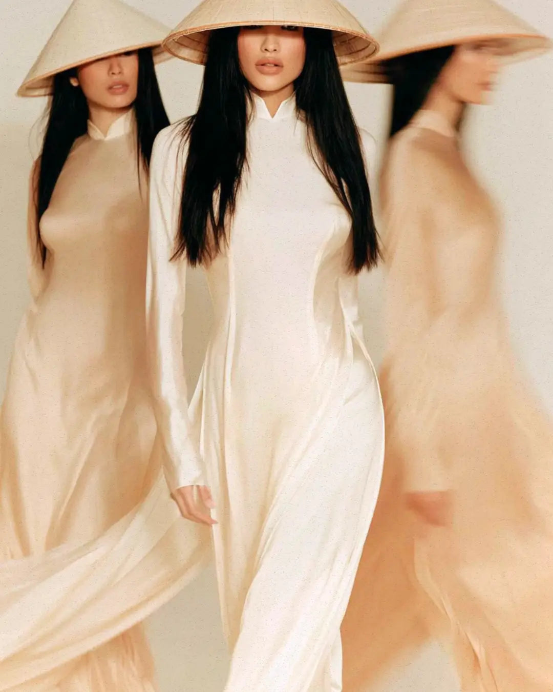CoBa's Daughter Vietnamese heritage inspiration — models wearing traditional conical hats and flowing white Áo Dài.